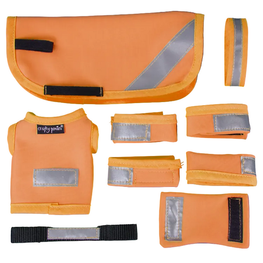 Set of orange reflective safety gear including a vest and multiple straps on a white background.