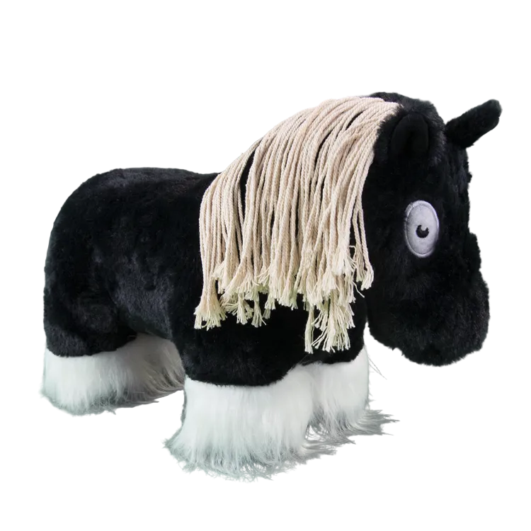 pony toy wearing white feathers